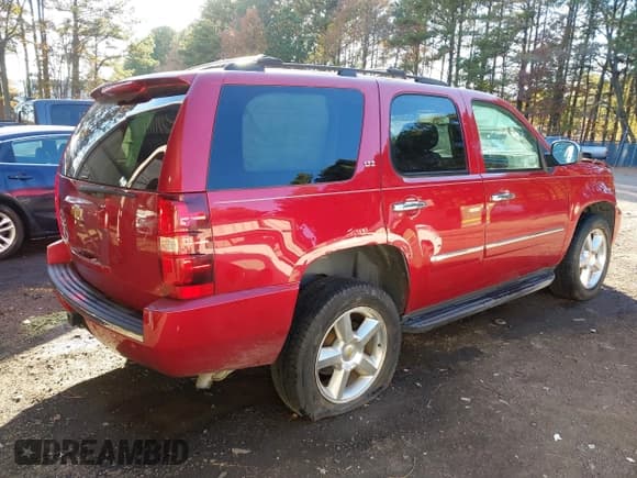 ✅ 2014 Chevrolet Tahoe LTZ • VIN: 1GNSKCE01ER160475 • Lot: 43675335. Listed on IAAI with 104,232 mi. Free auction sales archive from the USA and detailed vehicle history report at DreamBid. Image 4.