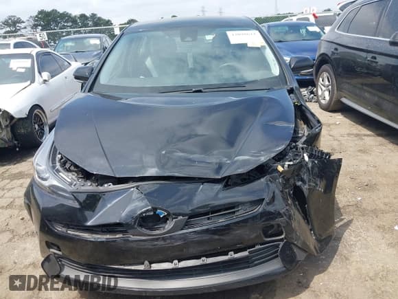 ✅ 2022 Toyota Prius L Eco • VIN: JTDKAMFU8N3181135 • Lot: 42098611. Listed on IAAI with 69,949 mi. Free auction sales archive from the USA and detailed vehicle history report at DreamBid. Image 12.