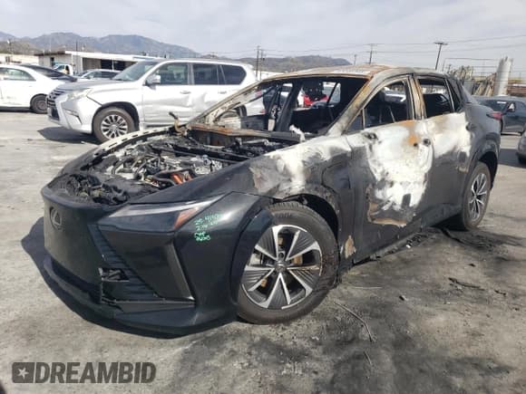 ✅ 2024 Lexus RZ 300e Premium • VIN: JTJABABB0RA004671 • Лот: 57287935. Опубликован ранее на Copart с пробегом Не указан. Бесплатный доступ к архиву аукционных продаж из США и подробный отчёт об истории автомобиля на DreamBid. Изображение 1.