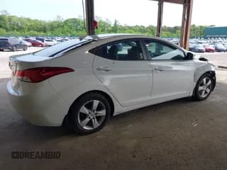 ✅ 2013 Hyundai Elantra GLS • VIN: 5NPDH4AE9DH392979 • Lot: 42394974. Listed on IAAI with 69,077 mi. Free auction sales archive from the USA and detailed vehicle history report at DreamBid. Image 4.