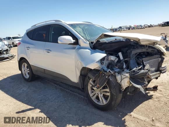 2012 Hyundai Tucson GLS z VIN KM8JUCAC1CU417011, wystawiony jako Copart lot #68081894 z przebiegiem 163 899 mil mil oraz Szkoda całkowita • Salvage title. Historia ofert i sprzedaży dostępna na DreamBid. Obrazek 4.