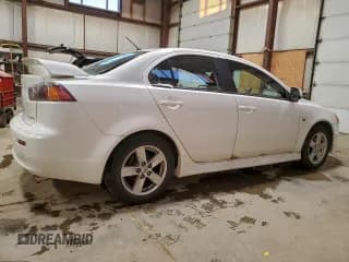 ✅ 2014 Mitsubishi Lancer ES • VIN: JA32U2FU5EU604466 • Lot: 94666035. Listed on Copart with 129,583 mi. Free auction sales archive from the USA and detailed vehicle history report at DreamBid. Image 3.
