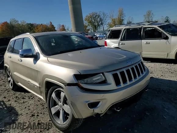 ✅ 2014 Jeep Grand Cherokee Overland • VIN: 1C4RJFCT9EC147999 • Lot: 89689645. Listed on Copart with 133,640 mi. Free auction sales archive from the USA and detailed vehicle history report at DreamBid. Image 14.