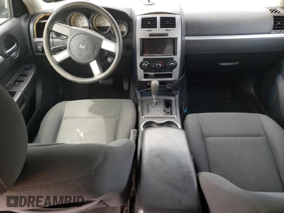 2010 Dodge Charger SXT с VIN 2B3CA3CV8AH247770, выставлен на аукционе Copart как лот 62915244 с пробегом 132 550 миль миль и Списание • Salvage title. История ставок и продаж доступна на DreamBid. Изображение 8.