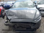 ✅ 2017 Ford Fusion Hybrid Titanium • VIN: 3FA6P0RU5HR301716 • Lot: 42017600. Listed on IAAI with 147,232 mi. Free auction sales archive from the USA and detailed vehicle history report at DreamBid. Image 12.