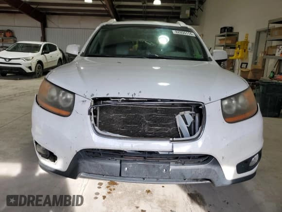 ✅ 2011 Hyundai Santa Fe SE • VIN: 5XYZHDAG5BG046293 • Lot: 82055114. Listed on Copart with 245,922 mi. Free auction sales archive from the USA and detailed vehicle history report at DreamBid. Image 5.