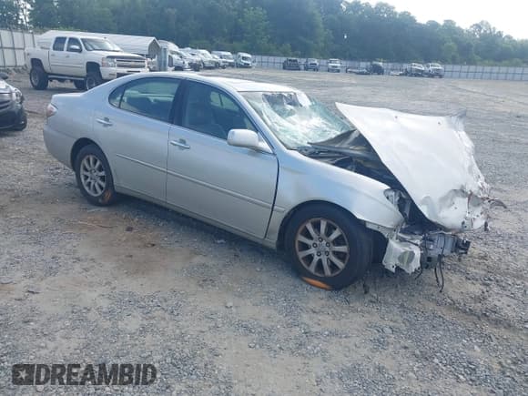 ✅ 2002 Lexus ES 300 • VIN: JTHBF30G220025571 • Lot: 42289997. Listed on IAAI with 87,554 mi. Free auction sales archive from the USA and detailed vehicle history report at DreamBid. Image 1.