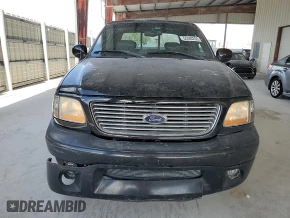✅ 2003 Ford F-150 Harley-Davidson • VIN: 1FTRW07343KD83293 • Lot: 55600275. Listed on Copart with 176,233 mi. Free auction sales archive from the USA and detailed vehicle history report at DreamBid. Image 5.