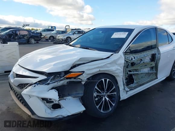 ✅ 2018 Toyota Camry XLE • VIN: 4T1B11HKXJU557537 • Лот: 43556168. Опубликован ранее на IAAI с пробегом 150 267 миль. Бесплатный доступ к архиву аукционных продаж из США и подробный отчёт об истории автомобиля на DreamBid. Изображение 6.