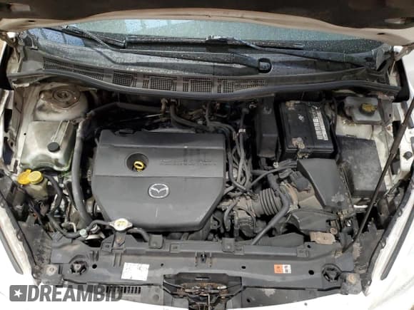 ✅ 2012 Mazda 5 Grand Touring • VIN: JM1CW2DL1C0102066 • Lot: 90987395. Listed on Copart with 221,287 mi. Free auction sales archive from the USA and detailed vehicle history report at DreamBid. Image 12.