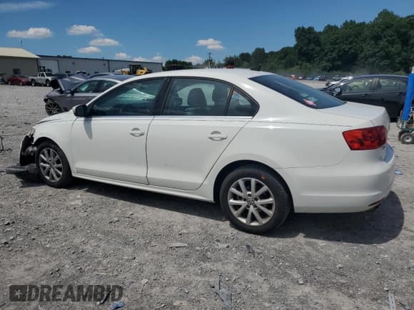 ✅ 2013 Volkswagen Jetta SE • VIN: 3VWDP7AJ5DM354447 • Lot: 63147215. Listed on Copart with 159,684 mi. Free auction sales archive from the USA and detailed vehicle history report at DreamBid. Image 2.