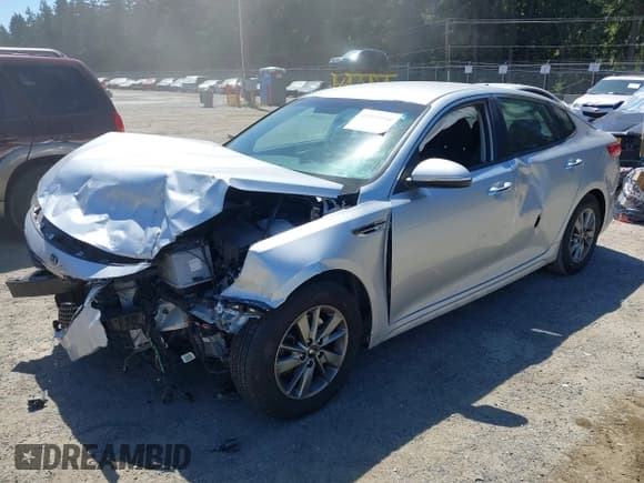 ✅ 2016 Kia Optima LX Turbo • VIN: 5XXGT4L1XGG059003 • Lot: 42855984. Listed on IAAI with 84,625 mi. Free auction sales archive from the USA and detailed vehicle history report at DreamBid. Image 2.