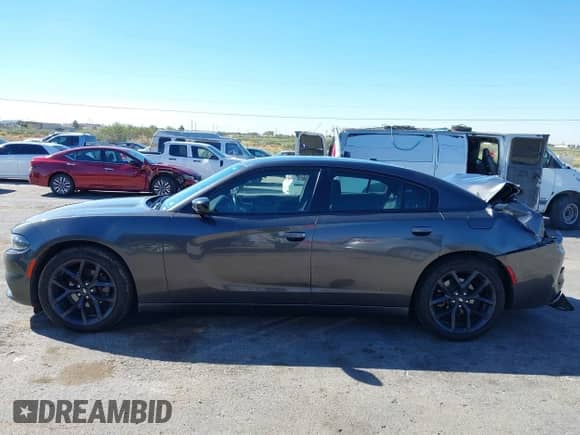 2019 Dodge Charger SXT с VIN 2C3CDXBGXKH685714, выставлен на аукционе IAAI как лот 43277448 с пробегом 153 435 миль миль и . История ставок и продаж доступна на DreamBid. Изображение 14.