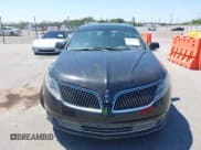 ✅ 2013 Lincoln MKS EcoBoost • VIN: 1LNHL9FT5DG608587 • Lot: 43184590. Listed on IAAI with 141,182 mi. Free auction sales archive from the USA and detailed vehicle history report at DreamBid. Image 12.