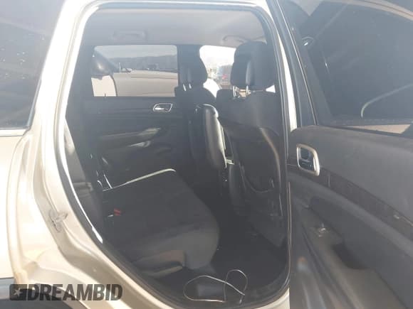 ✅ 2011 Jeep Grand Cherokee Laredo • VIN: 1J4RR4GG4BC585572 • Lot: 43600406. Listed on IAAI with 125,125 mi. Free auction sales archive from the USA and detailed vehicle history report at DreamBid. Image 8.