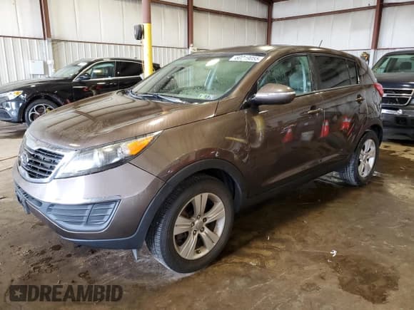 ✅ 2012 Kia Sportage LX • VIN: KNDPB3A28C7331687 • Lot: 60219055. Wystawiony na Copart z przebiegiem 87 591 mil. Bezpłatny archiwum sprzedaży aukcyjnych z USA i szczegółowy raport historii pojazdu na DreamBid. Zdjęcie 1.