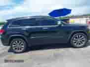 2018 Jeep Grand Cherokee Limited z VIN 1C4RJEBG7JC353475, wystawiony jako IAAI lot #43057910 z przebiegiem 87 674 mil mil oraz . Historia ofert i sprzedaży dostępna na DreamBid. Obrazek 13.