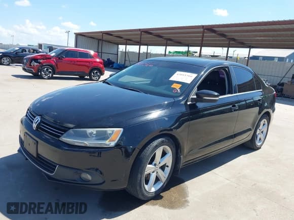 ✅ 2012 Volkswagen Jetta TDI w/Premium & Nav • VIN: 3VWLL7AJ0CM410008 • Lot: 43011566. Listed on IAAI with 207,018 mi. Free auction sales archive from the USA and detailed vehicle history report at DreamBid. Image 21.