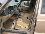 ✅ 1999 Jeep Cherokee Limited • VIN: 1J4FF78S8XL552596 • Lot: 49181115. Listed on Copart with 141,434 mi. Free auction sales archive from the USA and detailed vehicle history report at DreamBid. Image 7.