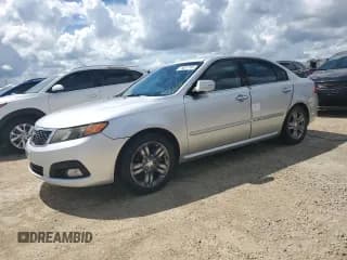 ✅ 2009 Kia Optima SX • VIN: KNAGE224395333740 • Lot: 73631794. Wystawiony na Copart z przebiegiem 129 225 mil. Bezpłatny archiwum sprzedaży aukcyjnych z USA i szczegółowy raport historii pojazdu na DreamBid. Zdjęcie 1.