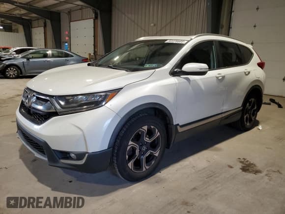 ✅ 2018 Honda CR-V Touring • VIN: 2HKRW2H91JH652005 • Лот: 92228885. Опубликован ранее на Copart с пробегом 143 582 миль. Бесплатный доступ к архиву аукционных продаж из США и подробный отчёт об истории автомобиля на DreamBid. Изображение 1.