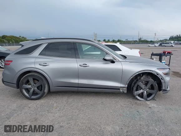 ✅ 2023 Genesis GV70 Sport • VIN: KMUMCDTC1PU098851 • Лот: 41864774. Опубликован ранее на IAAI с пробегом 15 016 миль. Бесплатный доступ к архиву аукционных продаж из США и подробный отчёт об истории автомобиля на DreamBid. Изображение 13.