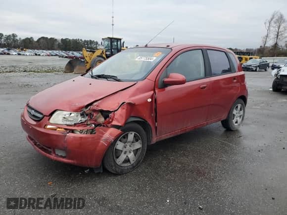 2007 Chevrolet Aveo LS z VIN KL1TD66627B686905, wystawiony jako Copart lot #85775504 z przebiegiem Nie podano mil oraz Szkoda całkowita • Salvage title. Historia ofert i sprzedaży dostępna na DreamBid. Obrazek 1.
