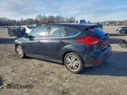 ✅ 2015 Ford Focus Titanium • VIN: 1FADP3N27FL235033 • Lot: 95573645. Wystawiony na Copart z przebiegiem 158 138 mil. Bezpłatny archiwum sprzedaży aukcyjnych z USA i szczegółowy raport historii pojazdu na DreamBid. Zdjęcie 2.