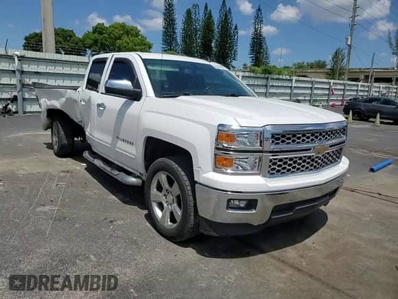 2015 Chevrolet Silverado 1500 LT with VIN 1GCRCREC8FZ362782, listed as a Copart auction lot 69407325 with 34,390 mi miles and Salvage title. Bid and sale history available at DreamBid. Image 13.