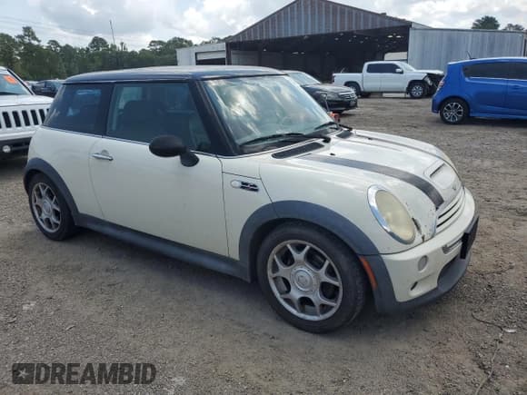 ✅ 2004 MINI Hardtop S • VIN: WMWRE33434TD81033 • Lot: 63759035. Listed on Copart with 319,648 mi. Free auction sales archive from the USA and detailed vehicle history report at DreamBid. Image 4.