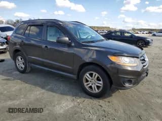 ✅ 2011 Hyundai Santa Fe GLS • VIN: 5XYZGDAG0BG012202 • Lot: 76364974. Listed on Copart with 108,287 mi. Free auction sales archive from the USA and detailed vehicle history report at DreamBid. Image 4.