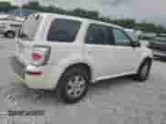 2011 Mercury Mariner z VIN 4M2CN8B71BKJ01749, wystawiony jako Copart lot #64199345 z przebiegiem 157 001 mil mil oraz Szkoda całkowita • Salvage title. Historia ofert i sprzedaży dostępna na DreamBid. Obrazek 3.