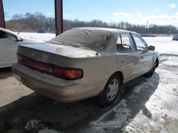 ✅ 1994 Toyota Camry LE • VIN: 4T1GK12E2RU002762 • Lot: 41376893. Listed on IAAI with 100,375 mi. Free auction sales archive from the USA and detailed vehicle history report at DreamBid. Image 4.