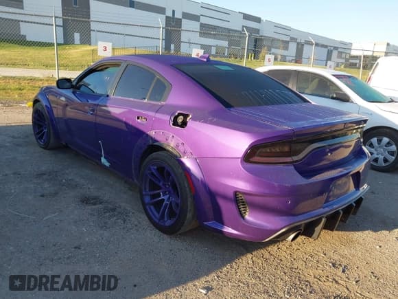 ✅ 2023 Dodge Charger Scat Pack Widebody • VIN: 2C3CDXGJ3PH624989 • Lot: 43398270. Listed on IAAI with 42,494 mi. Free auction sales archive from the USA and detailed vehicle history report at DreamBid. Image 3.