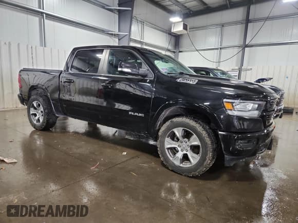 ✅ 2020 Ram 1500 Laramie • VIN: 1C6SRFJT9LN266576 • Lot: 84983125. Listed on Copart with 107,793 mi. Free auction sales archive from the USA and detailed vehicle history report at DreamBid. Image 4.