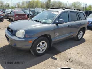 2001 Hyundai Santa Fe GLS z VIN KM8SC83D41U069325, wystawiony jako Copart lot #54377815 z przebiegiem 51 574 mil mil oraz Czysty tytuł • Clean title. Historia ofert i sprzedaży dostępna na DreamBid. Obrazek 1.