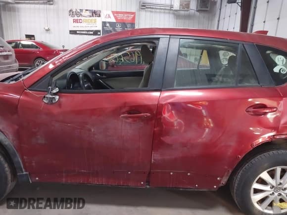 ✅ 2013 Mazda CX-5 Sport • VIN: JM3KE4BE7D0164630 • Lot: 41965600. Listed on IAAI with 157,879 mi. Free auction sales archive from the USA and detailed vehicle history report at DreamBid. Image 15.