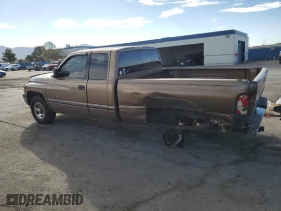 2000 Dodge 1500 z VIN 3B7HC13Z8YM241128, wystawiony jako Copart lot #76496774 z przebiegiem 125 929 mil mil oraz Szkoda całkowita • Salvage title. Historia ofert i sprzedaży dostępna na DreamBid. Obrazek 2.