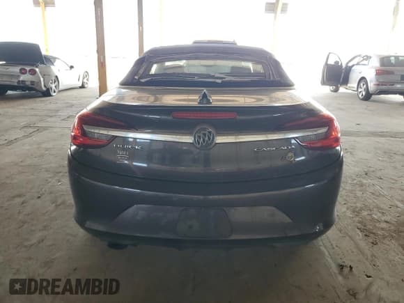 ✅ 2016 Buick Cascada Premium • VIN: W04WT3N57GG139612 • Lot: 90324125. Wystawiony na Copart z przebiegiem 108 986 mil. Bezpłatny archiwum sprzedaży aukcyjnych z USA i szczegółowy raport historii pojazdu na DreamBid. Zdjęcie 6.