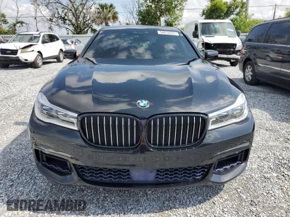 ✅ 2018 BMW 7 Series 750i • VIN: WBA7F0C58JGM22981 • Лот: 58816625. Опубликован ранее на Copart с пробегом 6 213 миль. Бесплатный доступ к архиву аукционных продаж из США и подробный отчёт об истории автомобиля на DreamBid. Изображение 5.
