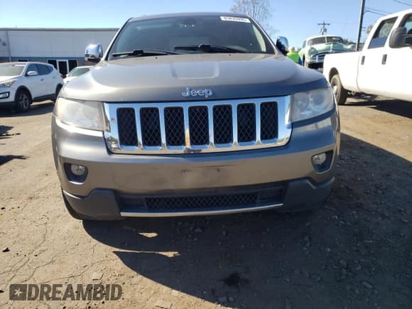 ✅ 2011 Jeep Grand Cherokee Overland • VIN: 1J4RR6GT1BC583870 • Lot: 85835995. Listed on Copart with 140,568 mi. Free auction sales archive from the USA and detailed vehicle history report at DreamBid. Image 5.
