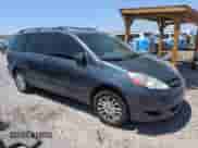 2009 Toyota Sienna LE with VIN 5TDBK23C09S023602, listed as a Copart auction lot 65241605 with 214,661 mi miles and Clean title. Bid and sale history available at DreamBid. Image 4.