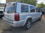 ✅ 2006 Jeep Commander • VIN: 1J8HH48NX6C269125 • Lot: 84370915. Listed on Copart with 144,143 mi. Free auction sales archive from the USA and detailed vehicle history report at DreamBid. Image 4.