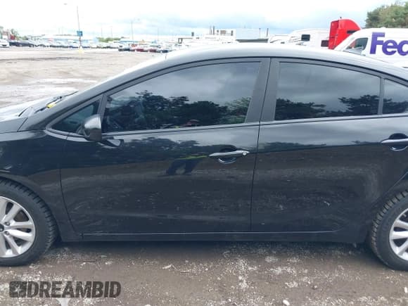 ✅ 2017 Kia Forte S • VIN: 3KPFL4A7XHE140547 • Lot: 42341551. Listed on IAAI with 123,462 mi. Free auction sales archive from the USA and detailed vehicle history report at DreamBid. Image 14.