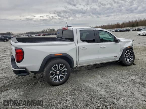 ✅ 2024 GMC Canyon 4WD AT4 • VIN: 1GTP6DEK0R1308050 • Лот: 95549815. Опубликован ранее на Copart с пробегом 6 937 миль. Бесплатный доступ к архиву аукционных продаж из США и подробный отчёт об истории автомобиля на DreamBid. Изображение 3.