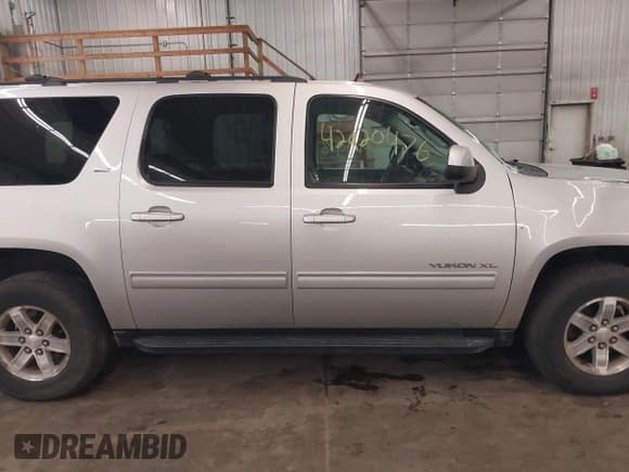✅ 2011 GMC Yukon XL SLT • VIN: 1GKS2KE34BR281921 • Lot: 42920476. Listed on IAAI with 167,530 mi. Free auction sales archive from the USA and detailed vehicle history report at DreamBid. Image 14.