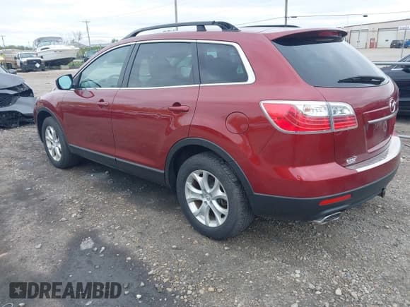 ✅ 2012 Mazda CX-9 Touring • VIN: JM3TB3CA7C0364666 • Lot: 42298217. Listed on IAAI with 122,443 mi. Free auction sales archive from the USA and detailed vehicle history report at DreamBid. Image 3.