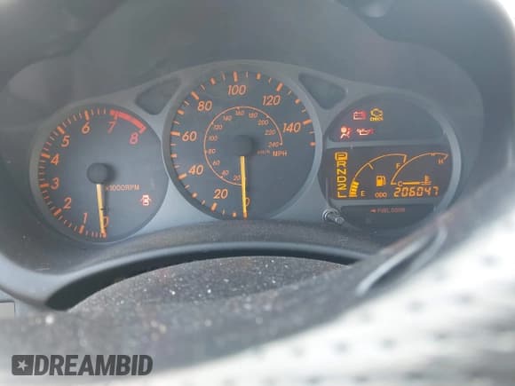 ✅ 2005 Toyota Celica GT • VIN: JTDDR32T950186208 • Lot: 43072527. Listed on IAAI with 206,047 mi. Free auction sales archive from the USA and detailed vehicle history report at DreamBid. Image 7.