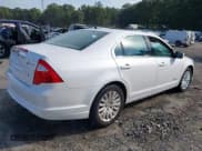 ✅ 2012 Ford Fusion Hybrid • VIN: 3FADP0L32CR371710 • Lot: 43224366. Listed on IAAI with 166,480 mi. Free auction sales archive from the USA and detailed vehicle history report at DreamBid. Image 4.