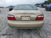 ✅ 2001 Mazda 626 LX • VIN: 1YVGF22C715202574 • Лот: 54132915. Опубликован ранее на Copart с пробегом 237 041 миль. Бесплатный доступ к архиву аукционных продаж из США и подробный отчёт об истории автомобиля на DreamBid. Изображение 6.